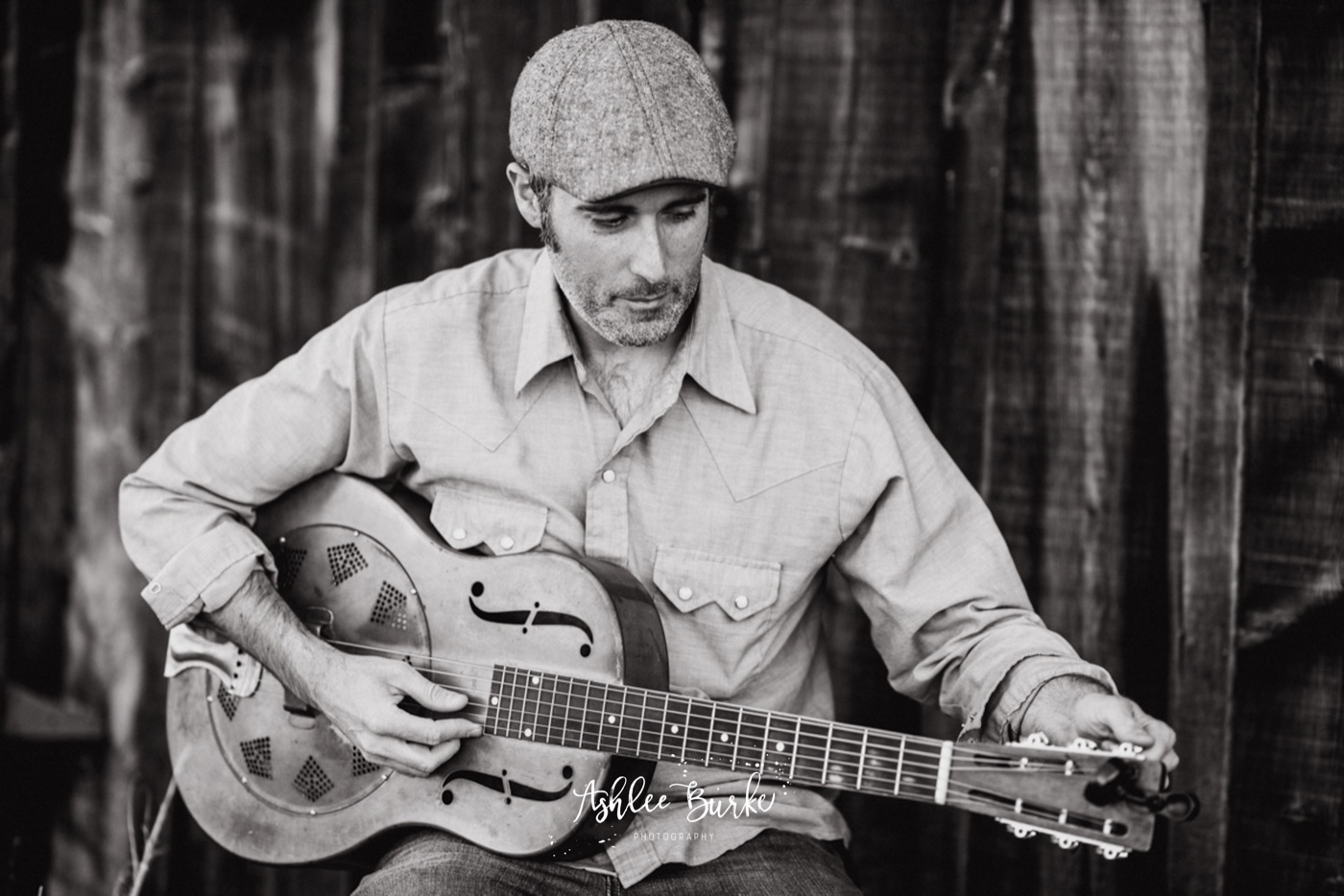 Steve Itterly with an acoustic guitar